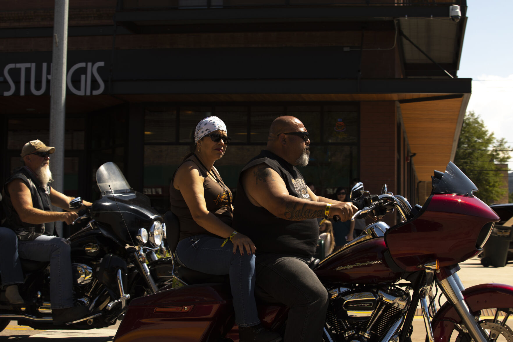 Motorcycles Ride Through Downtown